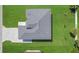 Aerial shot showcasing the roof, driveway, and surrounding landscaping of a modern single-Gathering home at 3323 Elkcam Blvd, Port Charlotte, FL 33952