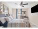 Cozy bedroom with stylish bed, contemporary furnishings, and decorative elements at 4311 123Rd W St, Cortez, FL 34215