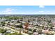 Aerial view of a home nestled in a vibrant community, close to golf courses and coastal areas at 3410 Allandale Dr, Holiday, FL 34691