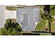 Overhead shot of a well-maintained home featuring a clean roof, and a tidy yard at 3410 Allandale Dr, Holiday, FL 34691