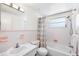 The charming bathroom features a bathtub, shower, and classic fixtures at 3410 Allandale Dr, Holiday, FL 34691
