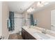 Bathroom features double sinks, a large mirror, and a shower-tub combination at 10720 Breaking Rocks Dr, Tampa, FL 33647