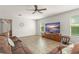 Comfortable living room with a large sectional sofa and neutral decor at 10720 Breaking Rocks Dr, Tampa, FL 33647