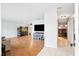 Bright living area with hardwood floors, neutral walls, and an open layout to other areas at 1302 Georgetowne Cir, Sarasota, FL 34232