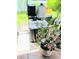 Backyard view showing AC unit and landscaping at 6640 121St Ave # 1, Largo, FL 33773