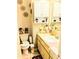 Bathroom with a single sink, vanity, toilet, and stylish decor at 6640 121St Ave # 1, Largo, FL 33773