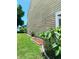 Attractive exterior featuring lush green lawn and meticulous landscaping at 6640 121St Ave # 1, Largo, FL 33773