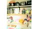 Shelves stocked full of cookware and food at 6640 121St Ave # 1, Largo, FL 33773