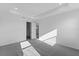 Expansive main bedroom featuring plush carpeting and an ensuite bathroom at 9596 Vibrant Lane, Venice, FL 34292