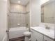 Bathroom featuring a shower-over-tub combination and a vanity with a sink at 11126 Jenny Wren Rd, Weeki Wachee, FL 34614
