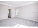 Spacious main bedroom with plush carpeting and plenty of natural light at 11126 Jenny Wren Rd, Weeki Wachee, FL 34614