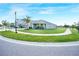 Well-maintained home with lush green lawn on a corner lot at 11818 Tetrafin Dr, Riverview, FL 33579