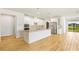 Open kitchen with stainless appliances, large island and ample natural light at 11818 Tetrafin Dr, Riverview, FL 33579
