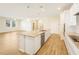 Open kitchen concept with an island featuring granite countertops and stainless appliances at 11818 Tetrafin Dr, Riverview, FL 33579