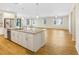Kitchen island with granite countertops, stainless appliances and open floor plan at 11818 Tetrafin Dr, Riverview, FL 33579