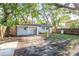 Spacious backyard featuring mature trees and a fenced in area at 709 1St Ne Ave, Largo, FL 33770