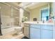Updated bathroom with shower-tub and vanity at 3805 E Bay Dr # 204, Holmes Beach, FL 34217