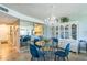 Dining room with chandelier at 3805 E Bay Dr # 204, Holmes Beach, FL 34217