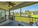 Screened patio overlooking green space and community pool at 3805 E Bay Dr # 204, Holmes Beach, FL 34217