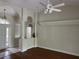 Entryway view shows decorative columns and open floorplan at 10533 Hazel St, Largo, FL 33778