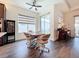 Bright dining area with contemporary furnishings and a view of the backyard at 15503 Corona Del Mar Dr, Wimauma, FL 33598