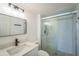 This bathroom is equipped with modern fixtures and a stylish shower with wave tile at 1967 Cormorant Ct # 516, Clearwater, FL 33762
