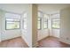 Spacious living room with lots of natural light and wood-look floors at 1967 Cormorant Ct # 516, Clearwater, FL 33762