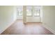 Bright living room featuring wood-look flooring and lots of natural light at 1967 Cormorant Ct # 516, Clearwater, FL 33762