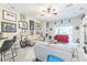 Spacious living area with neutral walls, carpeted floors, bar seating, and lots of art at 20074 Heritage Point Dr, Tampa, FL 33647