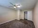 Bedroom with ceiling fan, window with blinds, and closet at 5627 Oakland Dr, Tampa, FL 33617