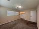 Bedroom with a ceiling fan, closet, and natural light from windows at 5627 Oakland Dr, Tampa, FL 33617