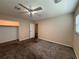 Bedroom featuring neutral walls, carpet, closet, and natural light at 5627 Oakland Dr, Tampa, FL 33617