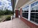 A brick-paved front porch welcomes you to this charming home with its neat windows and trim at 5627 Oakland Dr, Tampa, FL 33617