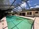 Inviting enclosed pool for outdoor enjoyment and relaxation with an attached home at 5627 Oakland Dr, Tampa, FL 33617
