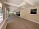 Sun room with ceiling fan and sliding glass doors at 5627 Oakland Dr, Tampa, FL 33617