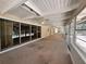 Sun room with ceiling fan and sliding glass doors offering pool views at 5627 Oakland Dr, Tampa, FL 33617