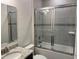 Well-appointed bathroom with a granite vanity and a tub/shower combination at 3441 Gramercy Ln, Spring Hill, FL 34609