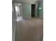 Neutral bedroom featuring carpeted floors, a closet, and an ensuite bathroom at 4650 Orlando Cir, Bradenton, FL 34207