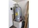 Interior view of the hot water heater with labels and surrounding utility components at 4650 Orlando Cir, Bradenton, FL 34207
