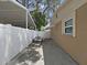 Private backyard features a concrete patio area, perfect for outdoor dining and entertaining at 2531 Lake Ellen Dr, Tampa, FL 33618