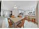 Open dining area connecting to kitchen with seating and table, natural light at 2531 Lake Ellen Dr, Tampa, FL 33618