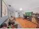 Comfortable living room with tile floors, neutral paint, and a large TV at 2531 Lake Ellen Dr, Tampa, FL 33618