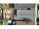 An aerial view of the backyard featuring a spacious brick patio and deck for outdoor enjoyment at 2904 Sanchez St, Tampa, FL 33605