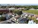 Great aerial view showing the neighborhood, tree coverage, and skyline in the distance at 2904 Sanchez St, Tampa, FL 33605