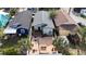 This backyard features a spacious brick patio and deck, perfect for outdoor entertaining at 2904 Sanchez St, Tampa, FL 33605