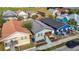 This beautiful single-Gathering home with a welcoming front porch and colorful neighboring houses at 2904 Sanchez St, Tampa, FL 33605