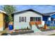 Charming home with a landscaped front yard, fresh paint, and new hardscaping at 2904 Sanchez St, Tampa, FL 33605