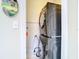 Modern, stacked washer and dryer in a laundry closet at 2904 Sanchez St, Tampa, FL 33605