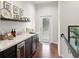 Beverage bar with extra storage located on the second floor at 15007 Laurel Cove Cir, Odessa, FL 33556