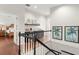 Hallway landing features a beverage bar and access to multiple rooms at 15007 Laurel Cove Cir, Odessa, FL 33556